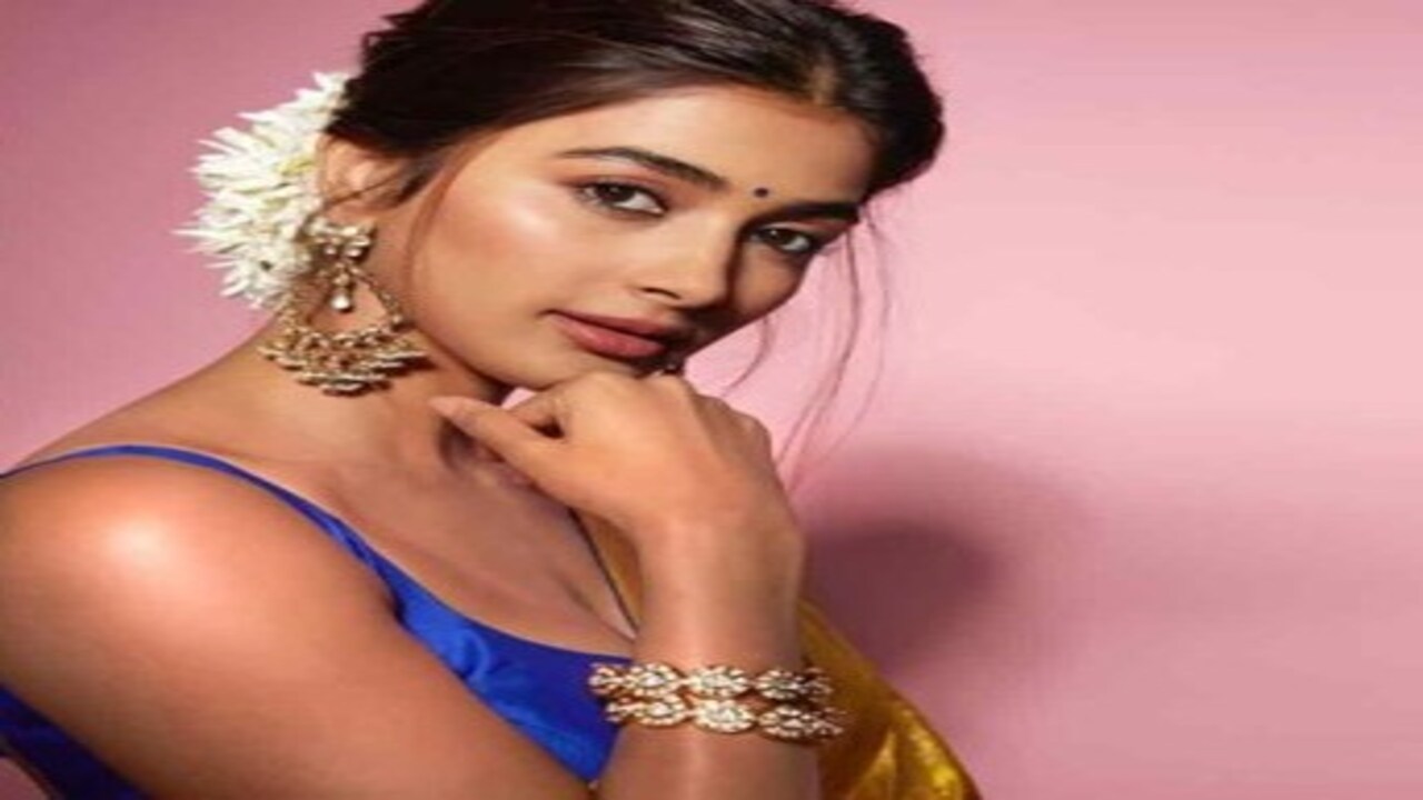 Pooja Hegde drops stunning pictures in golden sari