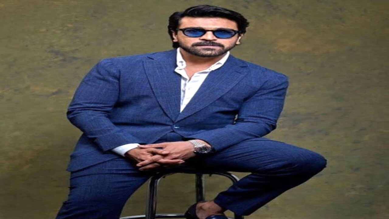 Ram Charan exudes an air of sharpness and sophistication while wearing a blue suit designed by Osman Abdul Razak